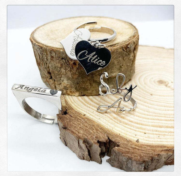 Anello cuore pendente