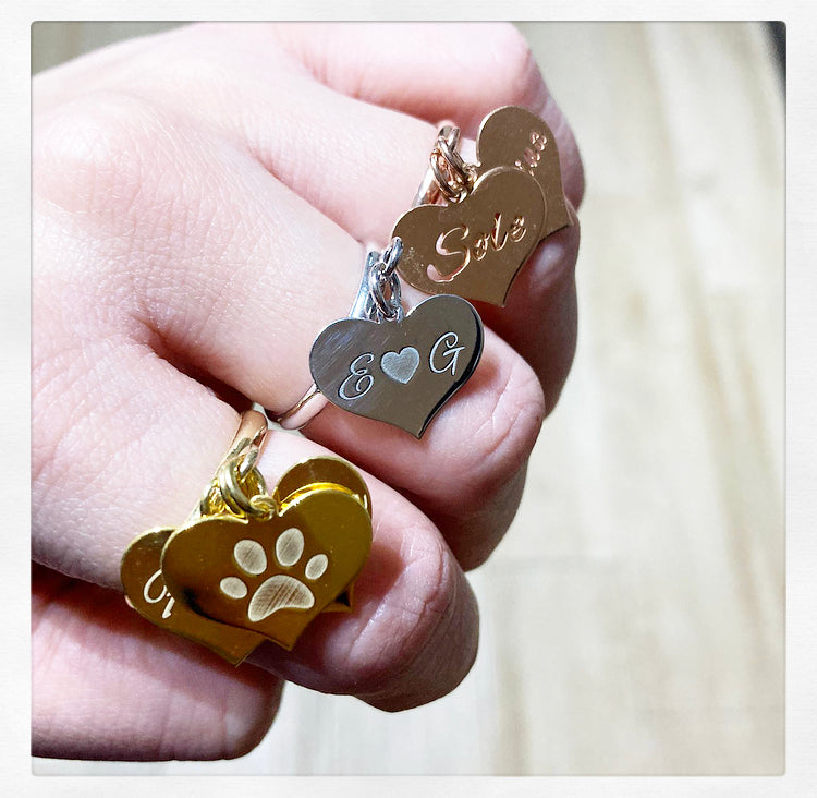 Anello cuore pendente